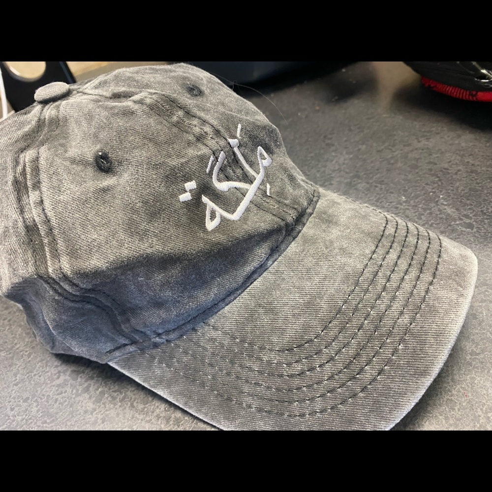 Female cap with Arabic writing